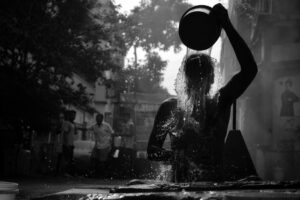 A Person Pouring Water Over their Head