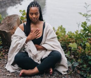 Close-Up Shot of a Woman Meditating