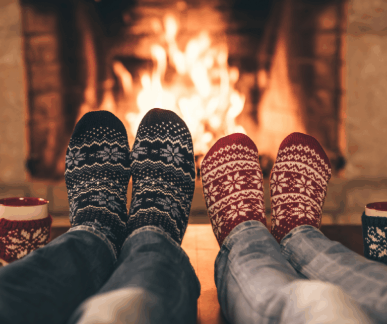 Warming feet by fire