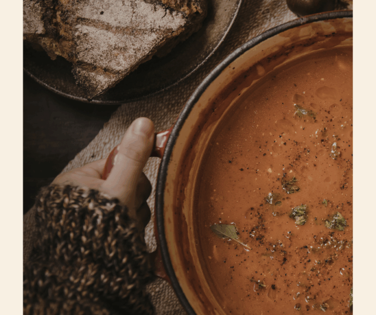 Bowl of curry in hand