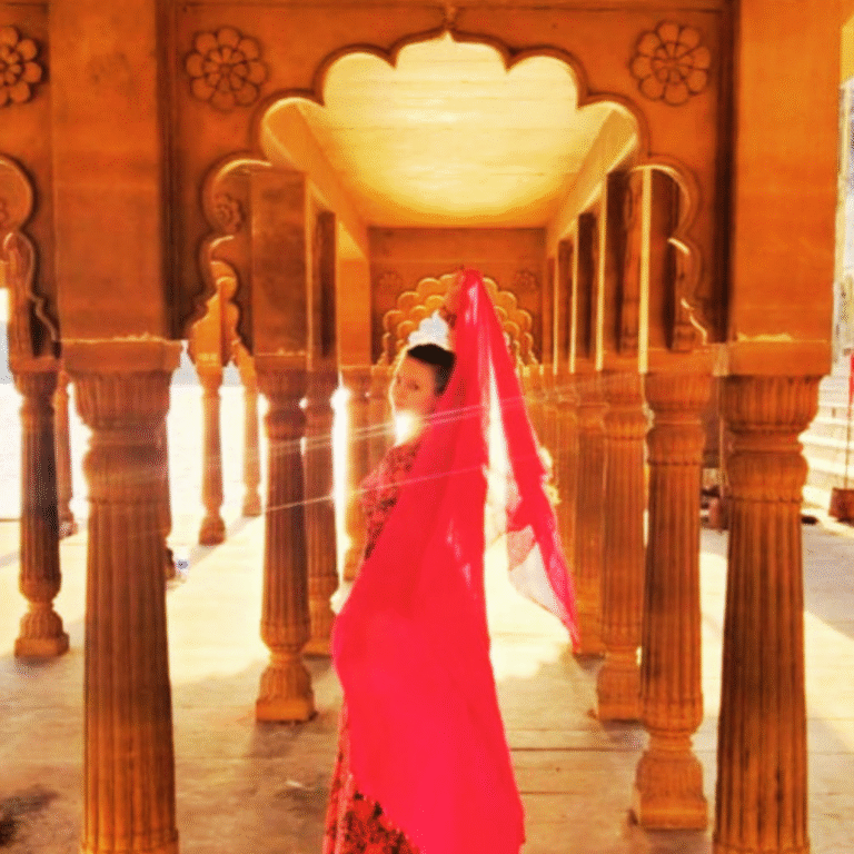 Corinne in a temple archway realising the divinity of her temple body